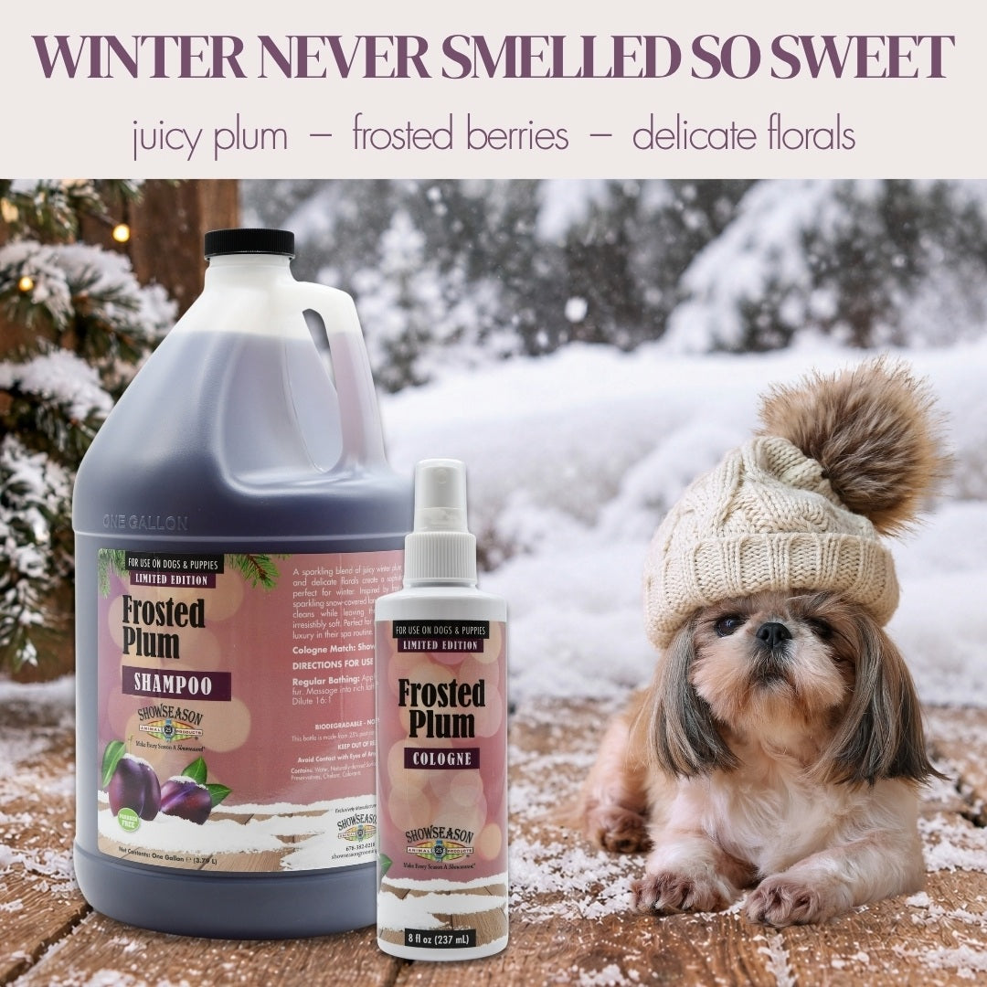 Showseason® Frosted Plum Pet Shampoo and Cologne beside a Shih Tzu in a knit hat on a snowy table. Text: “Winter never smelled so sweet. Juicy plum, frosted berries, and delicate florals.”